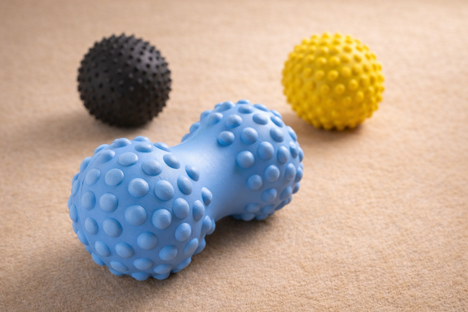 Deep tissue massage balls and peanut roller for muscle relief, trigger point therapy, and home recovery use.